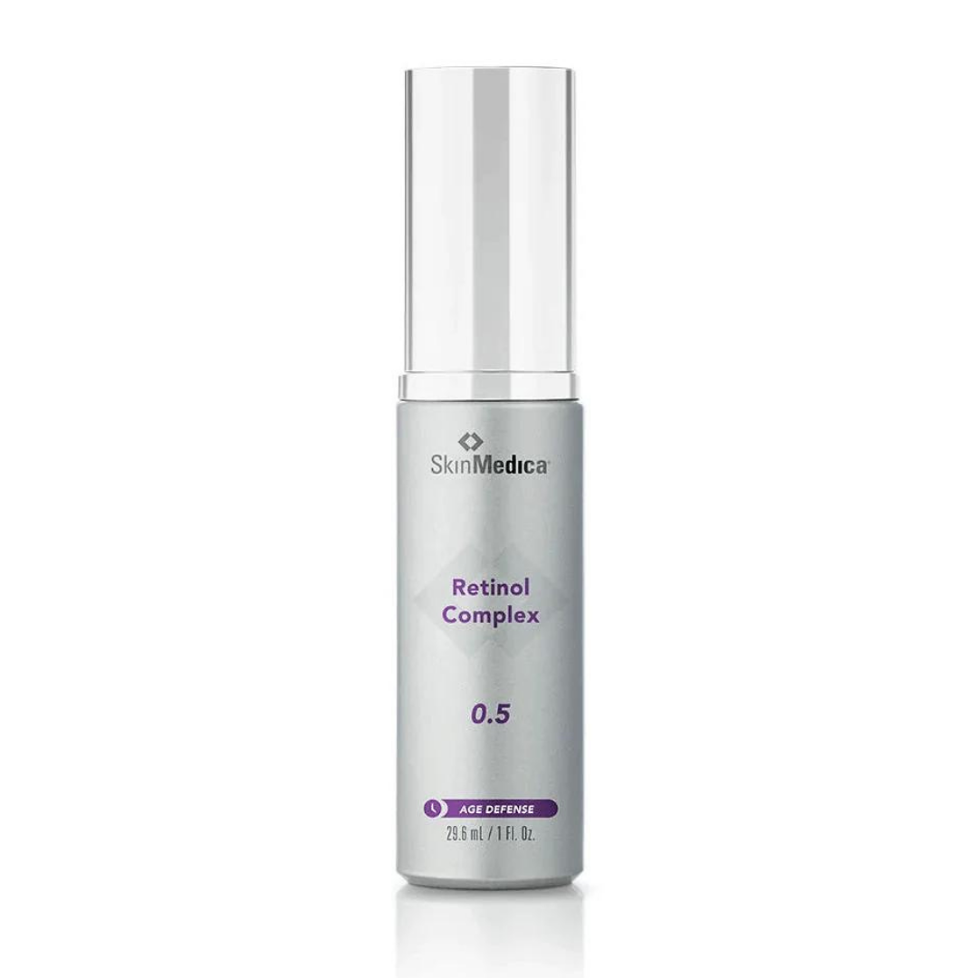 SkinMedica Retinol Complex 0.5 — sleek white and silver bottle with airless pump dispenser, displayed upright on a clean white background.